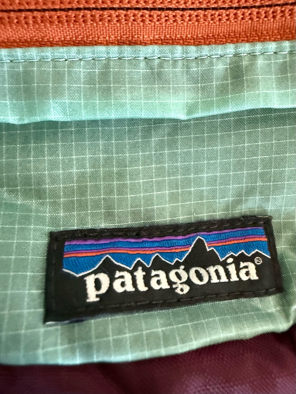 Patagonia Plum and Mint Crossbody Pack with Orange Zips - Picture 2 of 5